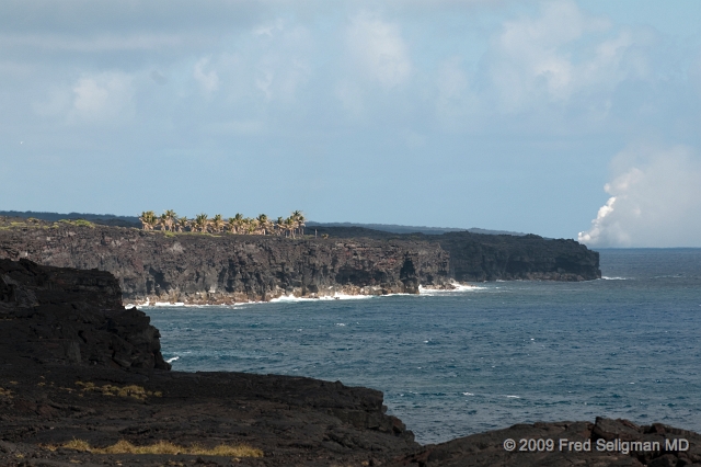 20091103_124411D3.jpg - Steam in distance is from the current (2009) eruption at 'end; of  route 130.  View is from near end of Chain of Craters Road.  Distance is about 6 miles. Road.  Distance is about 6 miles.