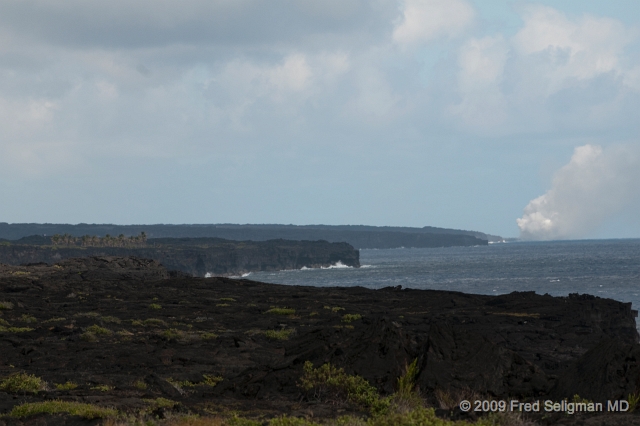 20091103_124842D3.jpg - Steam in distance is from the current (2009) eruption at 'end; of  route 130.  View is from near end of Chain of Craters Road.  Distance is about 6 miles.