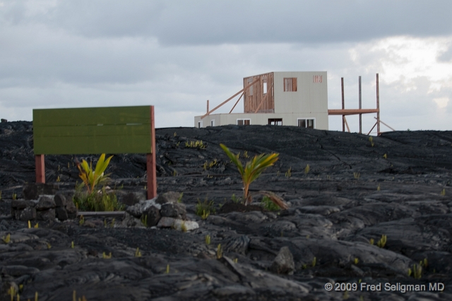 20091103_174545D3.jpg - Highway 130 comes to a abrupt end at the active lava flow.   Home being rebuilt.