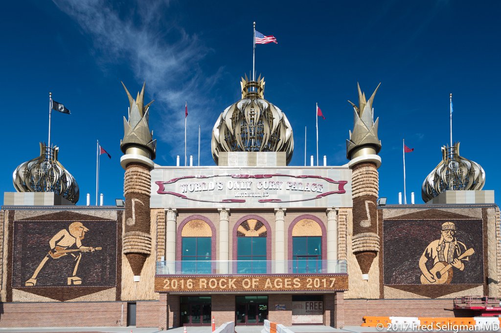 20170619_182245 D4S.jpg - The Corn Palace, commonly advertised as 'The World's Only Corn Palace' is a multi-purpose arena/facility located in Mitchell, South Dakota.  It is used for concerts, exhibits and sporting events. The murals and designs covering the building are made from corn and other grains, and a new design is constructed each year.  The adjacent street was under construction limiting photo views  The Palace was much more memorable the first time I saw this stucture 52 years ago because there was almost 'nothing' nearby.