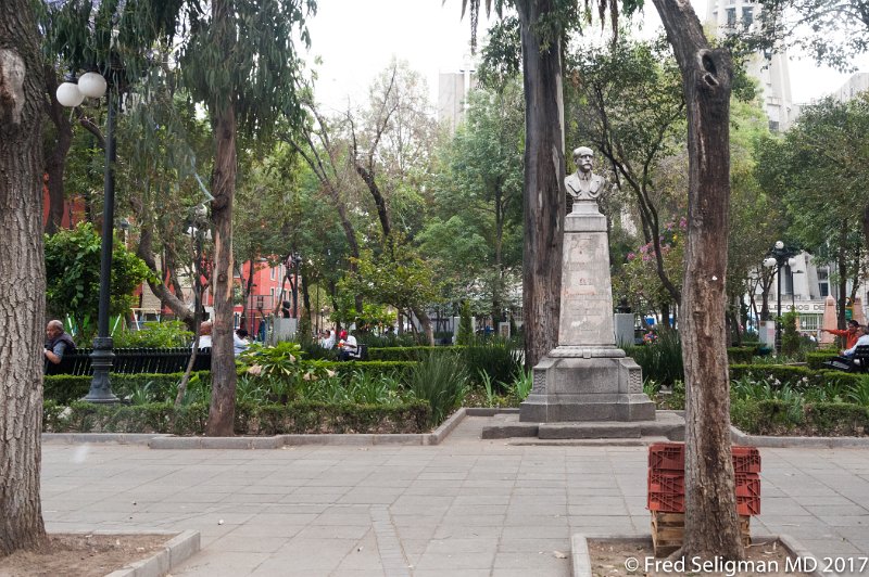 233 20170306_161036 D3S.jpg - Monument to Ernesto Pugibet in the Plaza de San Juan.  He is regarded as one of the key figures in Mexico's industrial revolution, at the turn of the 20th century, and a pioneer of early advertising.