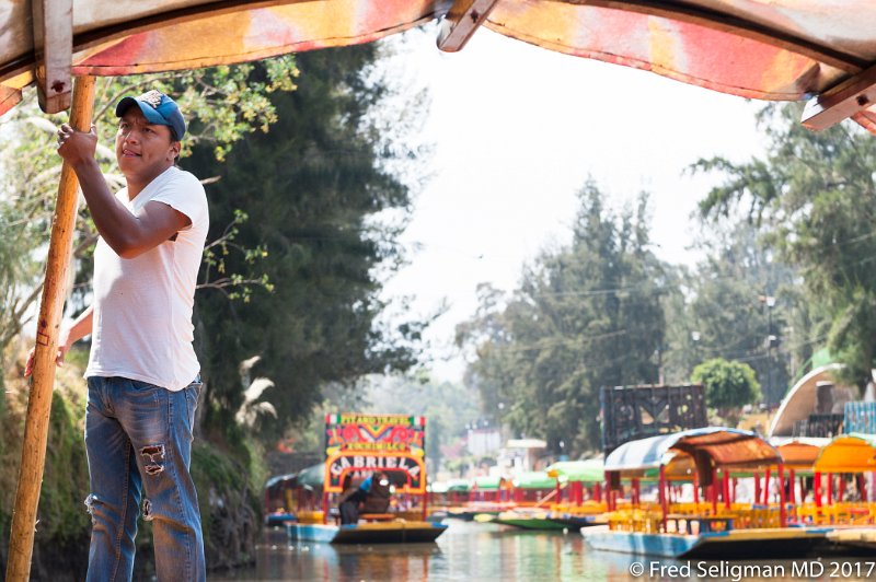 46 20170304_120656 D3S.jpg - Paddle-person on trajinera on Xochimilco canal